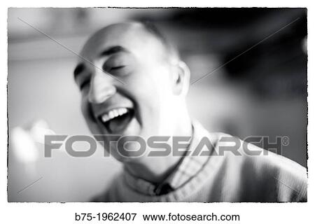 Happy man laughing View Large Photo Image Stock Photo - Happy man laughing. Fotosearch