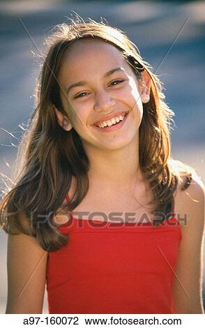 Happy pre-teen girl View Large Photo Image Stock Image - Happy pre-teen girl. Fotosearch