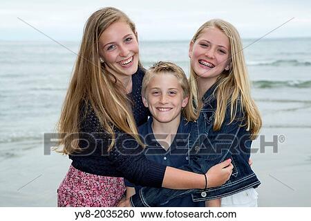 Happy siblings. View Large Photo Image Stock Image - Happy siblings.. Fotosearch