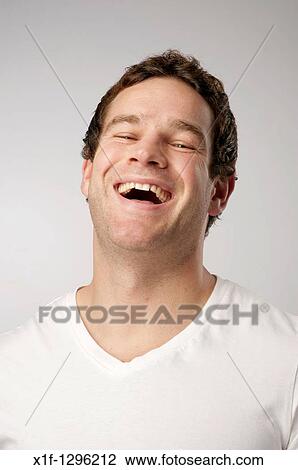 Stock Image - Happy smiling confident white caucasian male man.. Fotosearch