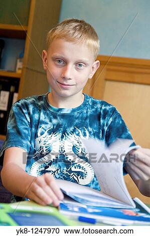Happy Teenage Boy Sitting at Home Desk and Learning View Large Photo Image Stock Image - Happy Teenage Boy Sitting at Home Desk and Learning. Fotosearch