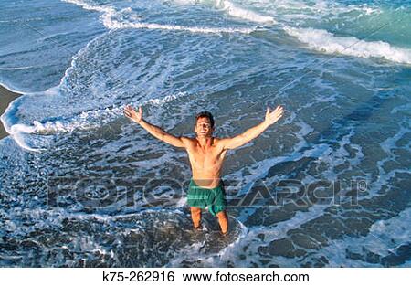 Stock Photograph - Happy to be at the beach. Fotosearch