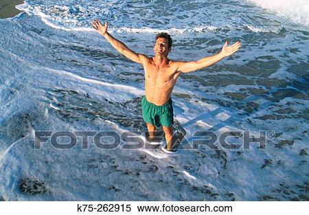 Stock Photography - Happy to be at the beach. Fotosearch