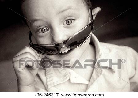 Happy toddler in Sunglasses View Large Photo Image Stock Photo - Happy toddler in Sunglasses. Fotosearch
