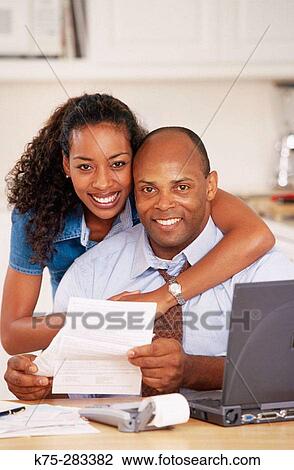 Happy with their home finances View Large Photo Image Stock Image - Happy with their home finances. Fotosearch