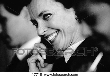 Happy woman on telephone View Large Photo Image Stock Photo - Happy woman on telephone. Fotosearch