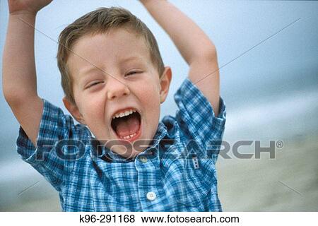 Stock Photo - happy young boy. Fotosearch