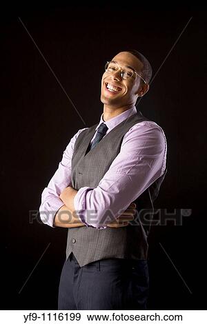 Stock Photo - Happy young businessman.. Fotosearch