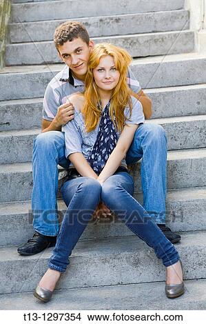 Picture - Happy young couple poses. Fotosearch
