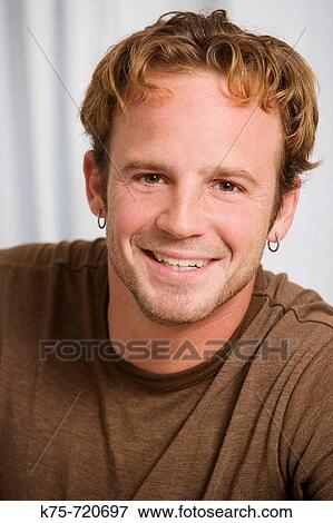 Happy young man View Large Photo Image Stock Photo - Happy young man. Fotosearch