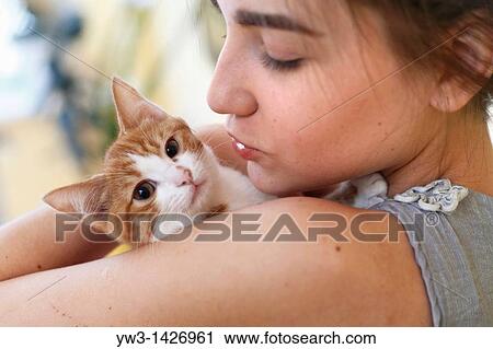 Happy young woman and red kitten View Large Photo Image Stock Image - Happy young woman and red kitten. Fotosearch