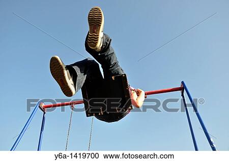 Happy young woman on swing View Large Photo Image Stock Image - Happy young woman on swing. Fotosearch