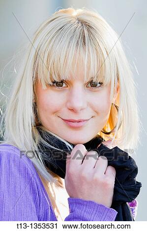 Stock Image - Happy young woman portrait. Fotosearch