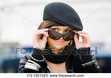 Happy young woman portrait with a beret and sunglasses View Large Photo Image Stock Image - Happy young woman portrait with a beret and sunglasses. Fotosearch