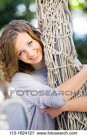 Stock Photo - Happy young woman. Fotosearch