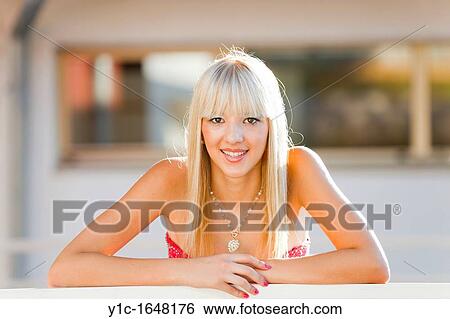 Stock Photograph - Happy young woman. Fotosearch
