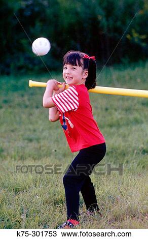 happyyoung girl playing whiffleball View Large Photo Image Stock Image - happyyoung girl playing whiffleball. Fotosearch