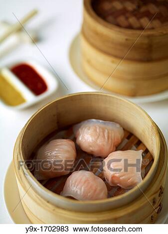 Har Gow, or shrimp dumpling, one of the most popular dishes in Chinese Dim Sum View Large Photo Image Stock Image - Har Gow, or shrimp dumpling, one of the most popular dishes in Chinese Dim Sum. Fotosearch