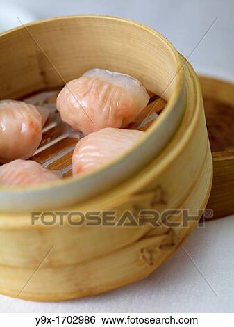 Har Gow, or shrimp dumpling, one of the most popular dishes in Chinese Dim Sum View Large Photo Image Stock Photograph - Har Gow, or shrimp dumpling, one of the most popular dishes in Chinese Dim Sum. Fotosearch