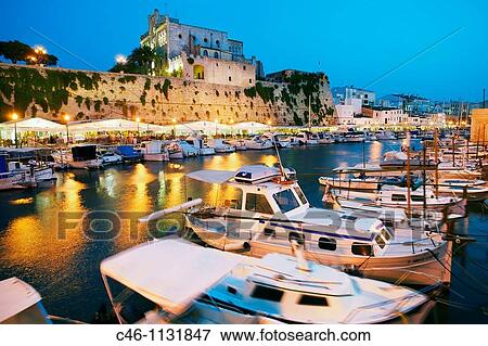 Harbor view with City Hall at sunset. Ciudadela. Minorca. Balearic Islands. Spain. View Large Photo Image Stock Photo - Harbor view with City Hall at sunset. Ciudadela. Minorca. Balearic Islands. Spain.. Fotosearch