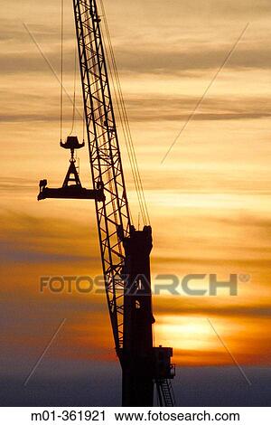 Stock Image - Harbour at sunset.. Fotosearch