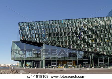 Harpa Concert Hall and Conference centre building designed by Hennin Larsen and Batter? i? Architects It is placed at Reykjavik harbour Iceland View Large Photo Image Stock Photo - Harpa Concert Hall and Conference centre building designed by Hennin Larsen and Batter? i? Architects It is placed at Reykjavik harbour Iceland. Fotosearch