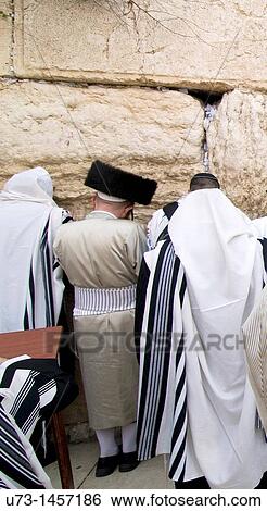 Hasidic Orthodox Jews praying by the wailing wall in the old city of Jerusalem. View Large Photo Image Stock Photograph - Hasidic Orthodox Jews praying by the wailing wall in the old city of Jerusalem.. Fotosearch