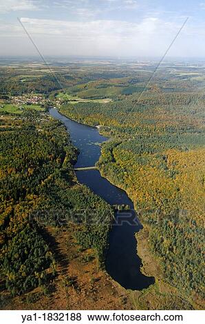 Stock Photo - Haspelschiedt lake in Natural Regional Park of Northern Vosges, Moselle, Lorraine, France. Fotosearch