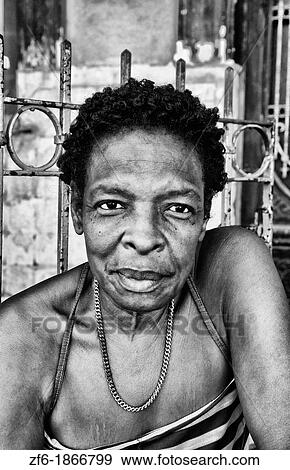 Havana capitol city of Cuba with local people portraits in their neighborhood in the city View Large Photo Image Stock Photo - Havana capitol city of Cuba with local people portraits in their neighborhood in the city. Fotosearch