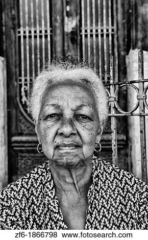 Havana capitol city of Cuba with older woman local people portraits in their neighborhood in the city View Large Photo Image Stock Photo - Havana capitol city of Cuba with older woman local people portraits in their neighborhood in the city. Fotosearch