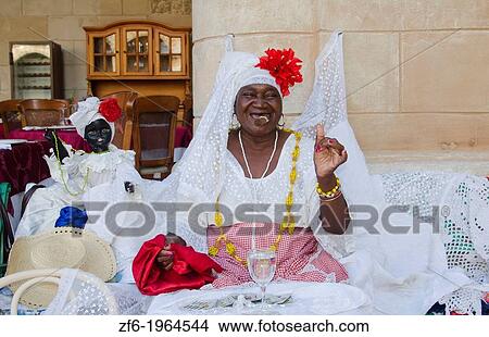 Havana Cuba Santeria woman local with Tarot cards and cigar for future readings. View Large Photo Image Picture - Havana Cuba Santeria woman local with Tarot cards and cigar for future readings.. Fotosearch