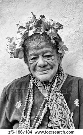 HavanaPortrait of old lady local woman with wrinkles in colorful wall in downtown Old Habana Cuba View Large Photo Image Picture - HavanaPortrait of old lady local woman with wrinkles in colorful wall in downtown Old Habana Cuba. Fotosearch
