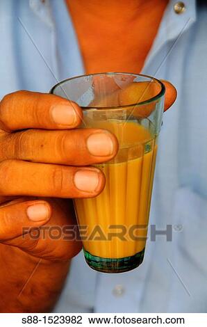 Stock Image - Have a break to have sweet chai. Fotosearch