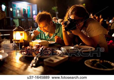Having dinner at Jimbaran Beach, Bali View Large Photo Image Stock Photo - Having dinner at Jimbaran Beach, Bali. Fotosearch