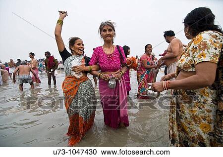 Having fun at the gangasagar mela in West Bengal, India. View Large Photo Image Stock Image - Having fun at the gangasagar mela in West Bengal, India.. Fotosearch