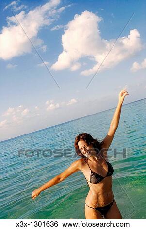 Having fun in the waters of Sicily Italy View Large Photo Image Stock Photograph - Having fun in the waters of Sicily Italy. Fotosearch