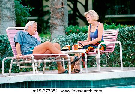 having lunch poolside View Large Photo Image Stock Image - having lunch poolside. Fotosearch