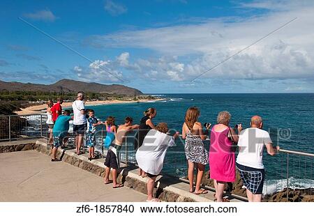Hawaii, Oahu, Honolulu, Tourists looking out over Halona Blow Hole View Large Photo Image Stock Image - Hawaii, Oahu, Honolulu, Tourists looking out over Halona Blow Hole. Fotosearch