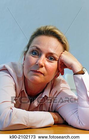 Head and shoulder image of caucasian woman, resting her head on her arm, Hamburg, Germany, Europe. View Large Photo Image Stock Image - Head and shoulder image of caucasian woman, resting her head on her arm, Hamburg, Germany, Europe.. Fotosearch