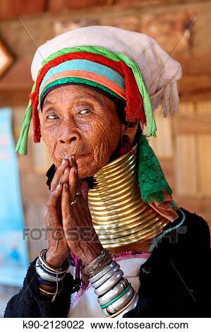Head and shoulder image of Longneck Karen woman forming her hands to a palm, Mae Hong Son, Thailand, Southeast Asia. View Large Photo Image Stock Image - Head and shoulder image of Longneck Karen woman forming her hands to a palm, Mae Hong Son, Thailand, Southeast Asia.. Fotosearch