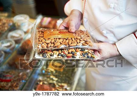 Head Chef Huang Lai Fa of The Grand Formosa Regent Hotel Taipei, posing and sampling food on Yongkang Street in Taipei, Taiwan View Large Photo Image Stock Image - Head Chef Huang Lai Fa of The Grand Formosa Regent Hotel Taipei, posing and sampling food on Yongkang Street in Taipei, Taiwan. Fotosearch