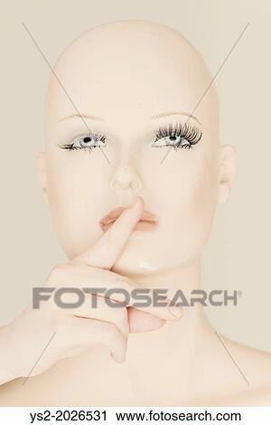 Head of mannequin with human hand covering the mouth. View Large Photo Image Stock Image - Head of mannequin with human hand covering the mouth.. Fotosearch