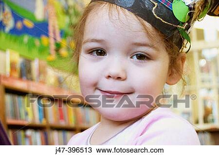 Headshot, 3 year old girl, smiling into camera, wearing a party hat View Large Photo Image Stock Image - Headshot, 3 year old girl, smiling into camera, wearing a party hat. Fotosearch