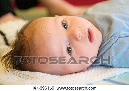 Headshot, 4 month old boy View Large Photo Image Stock Photo - Headshot, 4 month old boy. Fotosearch