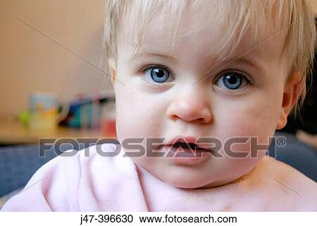 Headshot of 1 year old girl looking into camera View Large Photo Image Stock Image - Headshot of 1 year old girl looking into camera. Fotosearch