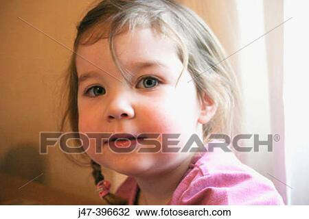 Headshot of 3 year old girl, looking looking into camera, smiling View Large Photo Image Stock Image - Headshot of 3 year old girl, looking looking into camera, smiling. Fotosearch