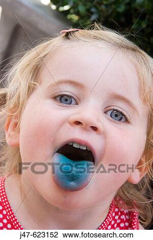 headshot of a 2 year ols girl sticking her blue tongue out at the camera, smiling View Large Photo Image Stock Image - headshot of a 2 year ols girl sticking her blue tongue out at the camera, smiling. Fotosearch