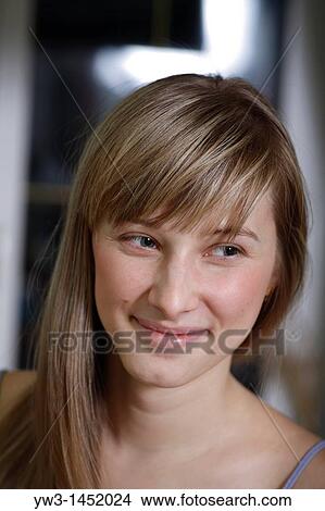 Headshot of a 24 year old blonde Caucasian woman wearing a tank top indoors View Large Photo Image Picture - Headshot of a 24 year old blonde Caucasian woman wearing a tank top indoors. Fotosearch