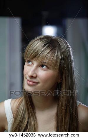 Headshot of a 24 year old blonde Caucasian woman wearing a tank top indoors View Large Photo Image Stock Image - Headshot of a 24 year old blonde Caucasian woman wearing a tank top indoors. Fotosearch