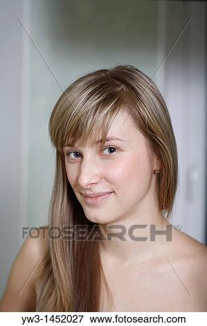 Headshot of a 24 year old blonde Caucasian woman indoors View Large Photo Image Stock Photo - Headshot of a 24 year old blonde Caucasian woman indoors. Fotosearch